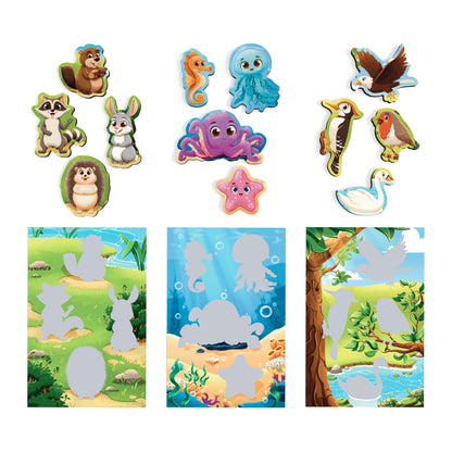 Three Bingo boards with grey silhouettes and matching wooden pieces for meadow, ocean and birds